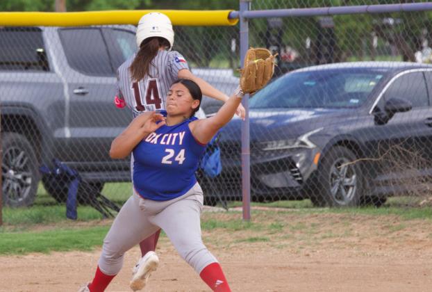 AUBREY LERMA makes the big stretch for the out. | SHERI BATY