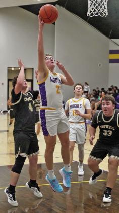 Connor Willison drives into the lane for a layup. | LACI BOWMAN
