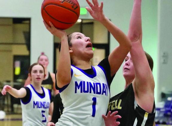 Desiree Carrasco makes a contested layup. | LACI BOWMAN