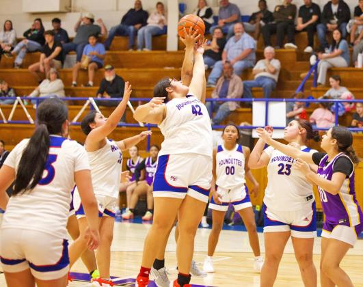 REACHING FOR THE REBOUND Knox City’s Audri Perez reaches for the rebound as the Houndettes tried to generate momentum for a playoff push. | SHERI BATY PHOTO