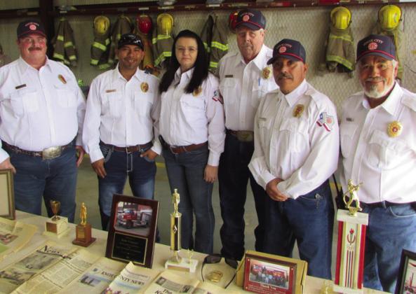 HISTORY HONORED Knox City VFD firefighters on hand March 2, from left - BJ Stewart, Adrian Soto,KelleyWebber,BillStewart,TeddyEspinosa, Mingo Garcia | DON THOMPSON PHOTOS