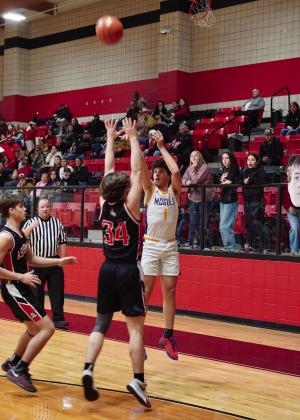 Caisen Lee drains the three ball. | LACI BOWMAN