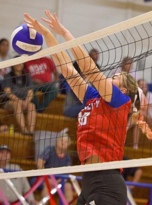 HOUNDETTES TAKE THE MATCH K’Lee Grimsley makes the big block against the Lady Stangs, winning last week’s home conference match against Benjamin in four sets, 16-25, 12-25, 25-23, 16-25. | SHERI BATY PHOTO