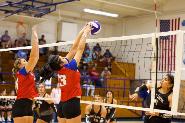 GOING FOR THE BLOCK Houndette Lexi Abila makes the block in last week’s game against Post. | SHERI BATY PHOTO