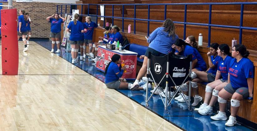 GIVE ME A BREAK! Water break time for the Houndettes was eagerly welcomed as they put in the time needed to prepare for a long volleyball season.