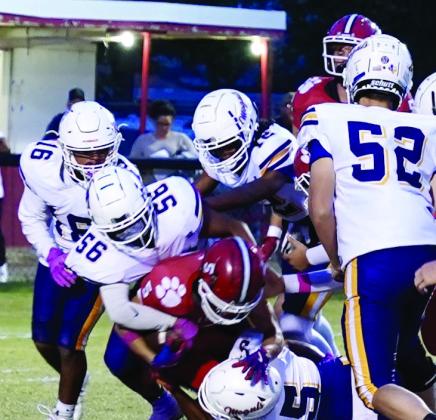 MOGULS DEFEATED BY TIGERS The Munday Moguls came up short against the Electra Tigers on Friday night. Even with the team plays like Kaleb Herrera and Ethan Flye making a big fourth down stop, and Carson Breedlove bringing down the ball carrier, the game ended with Electra taking the win with a score of 57-7. | LACI BOWMAN PHOTOS