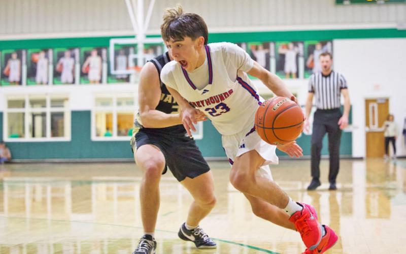 GREYHOUND ON THE RUN Izaiah Trevino, #23, proves a driving force for the Greyhounds on the court. | SHERI BATY PHOTO