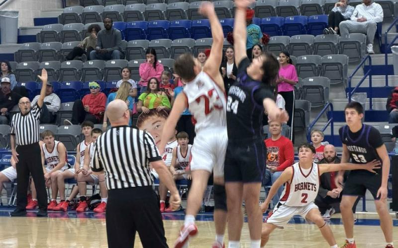 MUSTANGSWIN The Benjamin Mustangs boys varsity basketball team defeated the Aspermont Hornets Tuesday night in the bidistrict playoffs and will advance to the Area round. | COURTESY PHOTOS