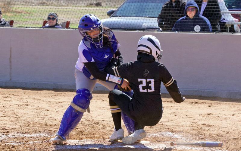 YER OUT! Lexi Abila makes the out at home.