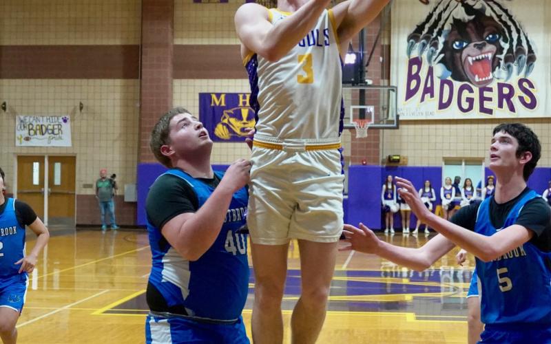 HAIDEN BOWMAN cuts back door and is rewarded with an easy layup.