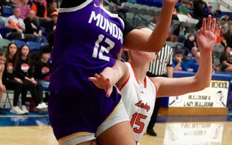 GOING UP STRONG Munday’s Nayeli Nunez goes up strong under the basket against Rotan. Neither team was initially able to generate enough momentum to spark a scoring run, but ate in the game Rotan pulled away to take the game 38-32. | LACI BOWMAN PHOTO