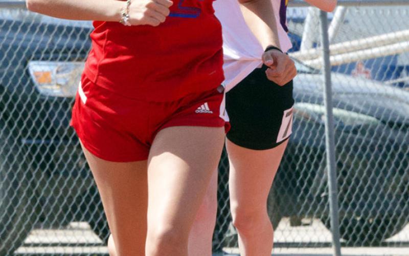TRACK EVENTS Bailey Espinosa sets her pace in the 800-meter run.