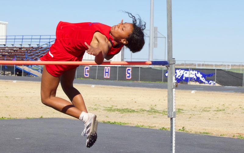 Munday’s Naveah Martinez competes in the high jump.