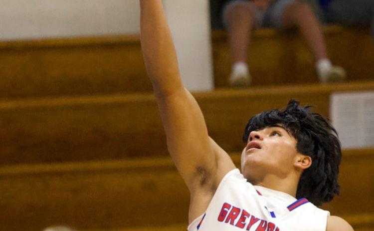 LAYUP FOR NET GAIN Knox City’s Zander Abila takes the layup for the net gain againstWoodson in last week’s game. | SHERI BATY PHOTO