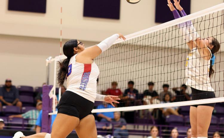 JUST A BITTOO HIGH Audrey Perez works to get the ball past the Mogulette blocker. Knox City won 3-1 in Benjamin on Sept. 19.