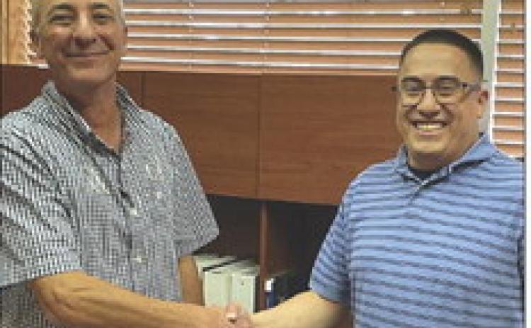 Dusty Bradley, left, welcomed by Brian Barboza, right. | PHOTO BY DON THOMPSON NEWS COURIER