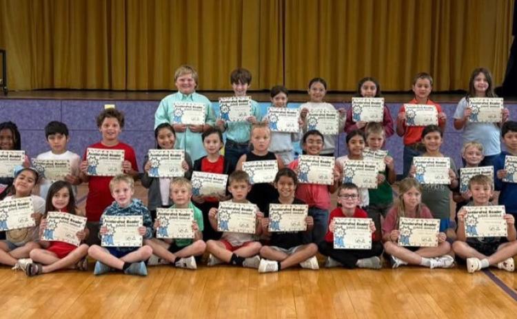 Munday Elem awards AR 50 points club 1st, 2nd, and 3rd graders