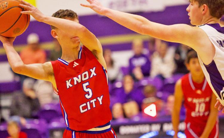 HOUNDS FACE PRESSURE Bently Stroud under pressure from Throckmorton. The Greyhounds entered the game seeking back-to-back victories after defeating Rotan the previous week. Knox City controlled the game from the opening tip. | SHERI BATY PHOTO