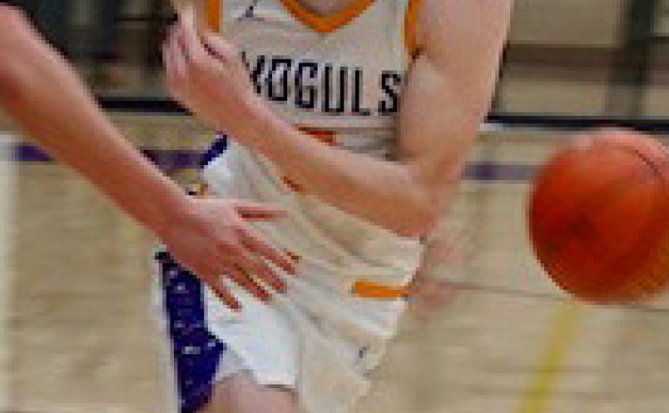 Haiden Bowman dribbles behind the pack and around the defender. | LACI BOWMAN PHOTOS