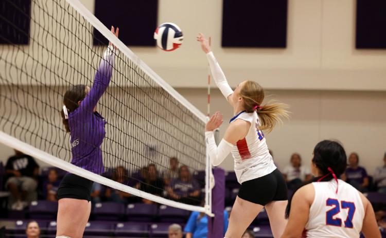 ABOVE THE NET Eren Howeth rises above, looking to earn a point for her Knox City team, in the victory at Benjamin Oct. 6. | SHERI BATY