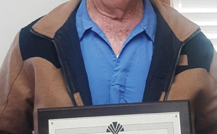 35 YEARS OF SERVICE Sammy Pierce has been serving on the Wichita-Brazos Soil and Water Conservation Board for 35 years. At the meeting held on December 10, he was presented with a plaque for his years of service. The State Soil andWater Conservation Board along with the local board appreciate Sammy’s continued service. | COURTESY PHOTO
