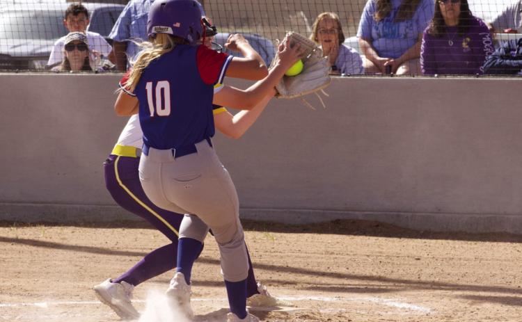 MHS pitcher Ambry Myers covers homeplate but Kinlee Eaton scores the run for the Houndettes | SHERI BATY PHOTO
