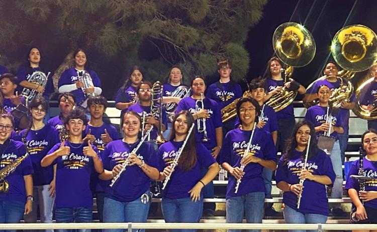 PURPLE CLOUD Munday band members are poised and ready for the region marching contest on Oct. 17 at Wichita Falls’Memorial Stadium. | TROY PARTON
