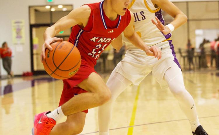 PUSHINGFORTHENET Knox City’s IzaiahTrevino pushes his way to the net versus the Munday Moguls. Munday dominated the game from the opening tip. The Greyhounds were able to score, but Munday kept pulling away to win the game 68-22. | SHERI BATY PHOTO