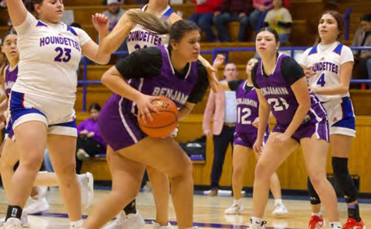 BACK-AND-FORTH BATTLE The Lady Stang grabs the rebound during last week’s January 23, game. The Lady Stangs were hoping to play the spoiler role to earn their first district win of the season but came up short losing to the Houndettes 44-21. | SHERI BATY PHOTO