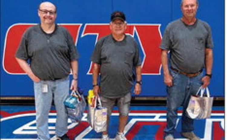 SPECIAL EFFORT Knox City–O’Brien CISD honored maintenance personnel at the football pep rally Friday. From left: Scott Eckman, Mackey Yates and Terry Butler, Maintenance Director. | COURTESY PHOTO