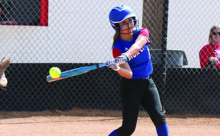 Rebecca Ruiz makes contact for the base hit Sheri Baty/The Knox County News-Courier