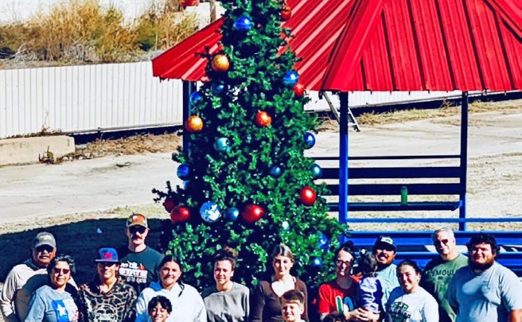 Knox City volunteers got up early last week, and helped put up and decorate the community Christmas tree and put lights on the gazebo and hang lighted garland on all the streetlights on Main Street and Central Avenue. | COURTESY PHOTO
