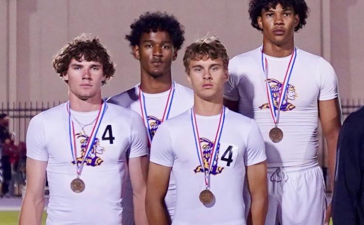 STATEBOUND Munday’s boys mile relay team of Haiden Bowman, Ja’Riyis Williams, Kiyryn Wilson and Luke Bowman will advance to State competition.