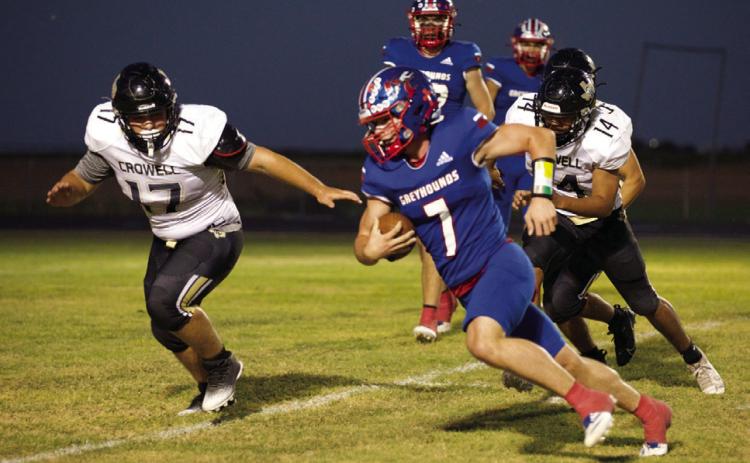 GREYHOUNDS TAKE DOWN WILDCATS KCHS Greyhounds played hard last Friday night versus the Crowell Wildcats. Jay Rick McGaughey heads for the endzone for the touchdown. The Greyhounds took the win 54-8 in the third quarter. | SHERI BATY