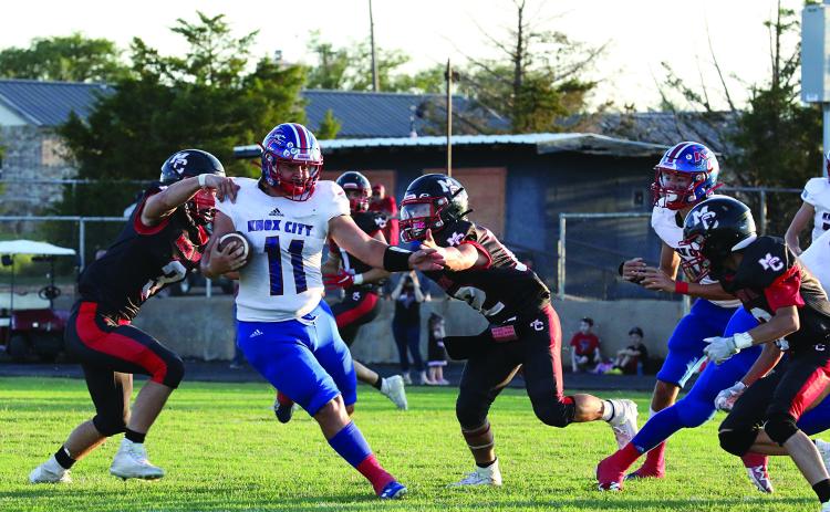 Tristin Baxter breaks the tackle for the first down Sheri Baty/The Knox County News-Courier