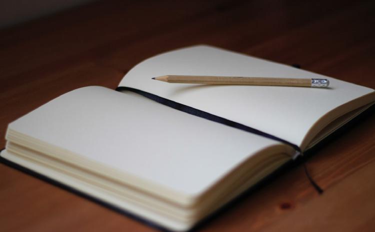 An empty journal is the beginning of your story | UNSPLASH.COM