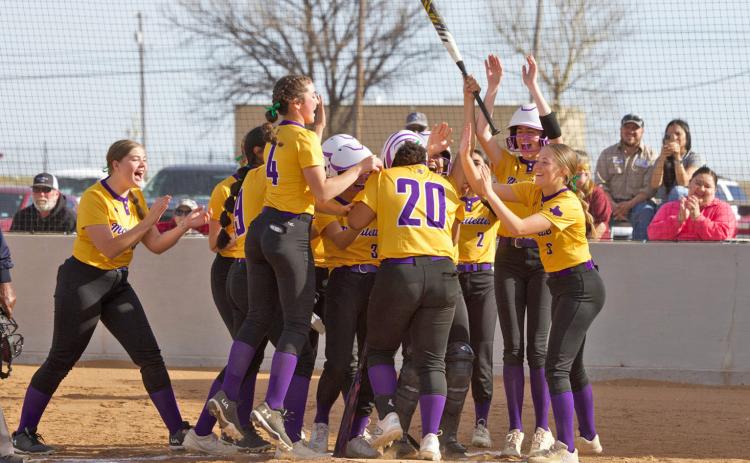 BATTLE OF KNOX COUNTY In the KCHS versus Munday softball game on Tuesday, March 17, the Mogulettes took the win over the Houndettes by the score of 25-3, celebrating the second of two over-the-fence home runs. FULL STORY, PAGE 6 | SHERI BATY PHOTO