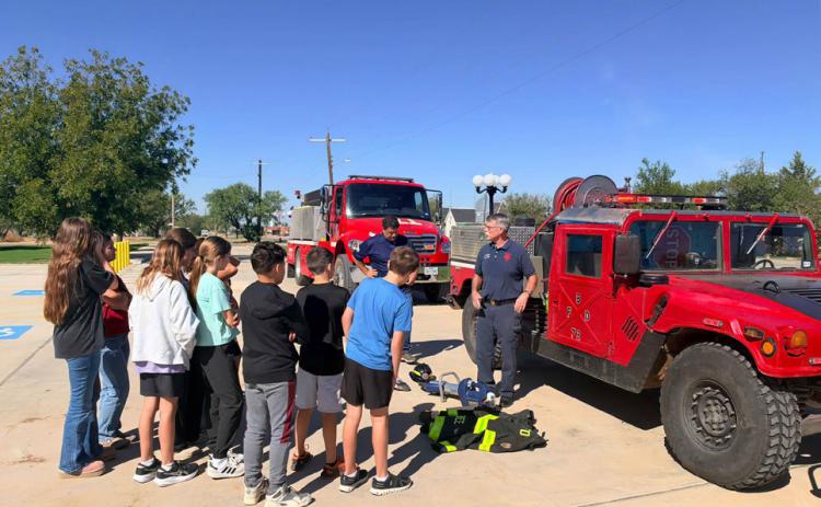 BRUSH TRUCK Chief Bisbee showed Benjamin students the brush truck and some of the equipment used to quickly stop a fire from spreading. | COURTESY PHOTO