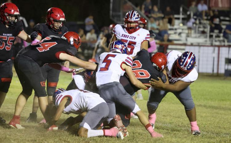 A PACK OF HOUNDS proved too much for the Raiders on Oct. 9, when the Greyhounds took the victory 52-0. | SHERI BATY