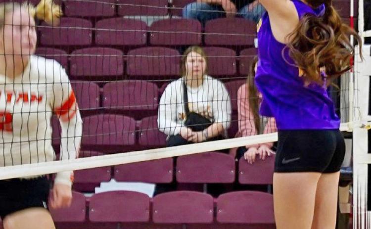 EXCELLENT BLOCKING Munday’s Olivia Myers makes a block at the net. | LACI BOWMAN PHOTO