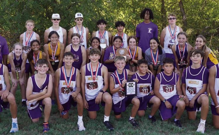 DISTRICT CHAMPS The Munday varsity and junior boys XC teams won their district championships this week at Copper Breaks. The varsity girls and junior high girls were district runners-up. | LACI BOWMAN PHOTO