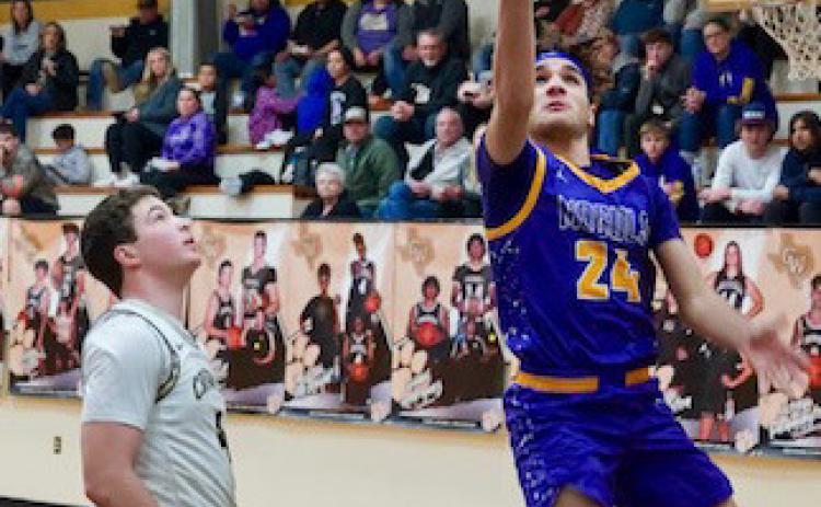 Mance Phillips with a layup to start the scoring for the Moguls. | LACI BOWMAN PHOTO