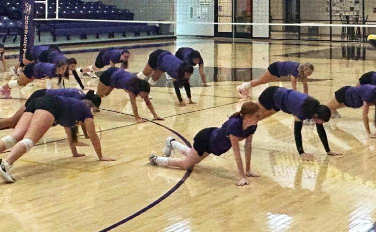 NEW COACH CASSIDY YOUNG led the Mogulettes in stretches before getting down to business. The Mogulettes will be competing in 2A District 7 this season, placing them in Region 1.