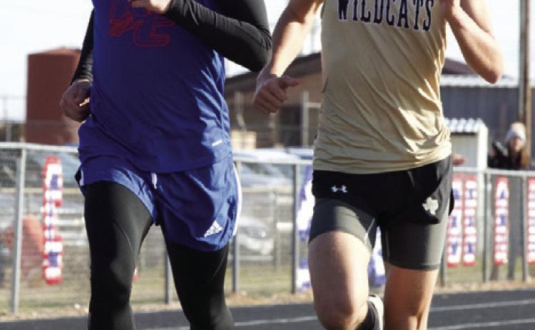 SethLogsdonsetsthepaceinthe 800Mrun. | SHERI BATY PHOTO