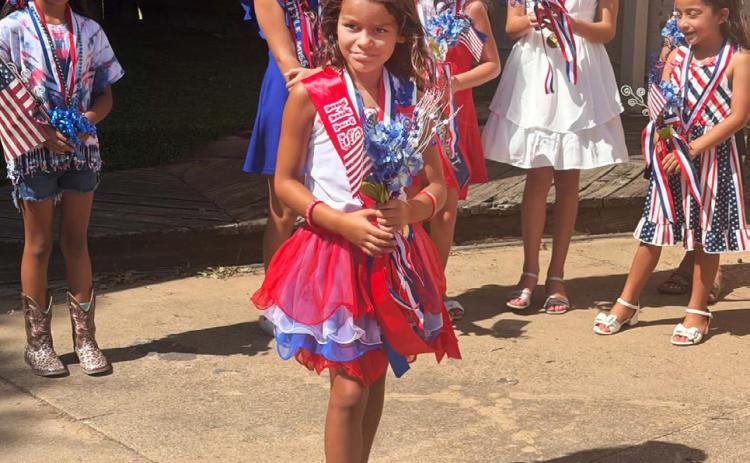 MISS FIRECRACKER The first contestants in the Munday Little Miss Firecracker contest prepared to compete for one of the three designations. | MORE PHOTOS, PAGE 6