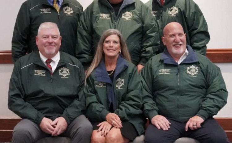 GREEN JACKET Longtime Tascosa girls wrestling coach Donna “Coach Welch” Daniel (front row, center), a science teacher and a 1968 graduate of Munday High School and the daughter of Lloyd Don Welch and Jaquita Welch, was inducted into the Texas chapter of the National Wrestling Hall of Fame recently at the Embassy Suites in Grapevine. | NATIONAL WRESTLING HALL OF FAME, TEXAS CHAPTER