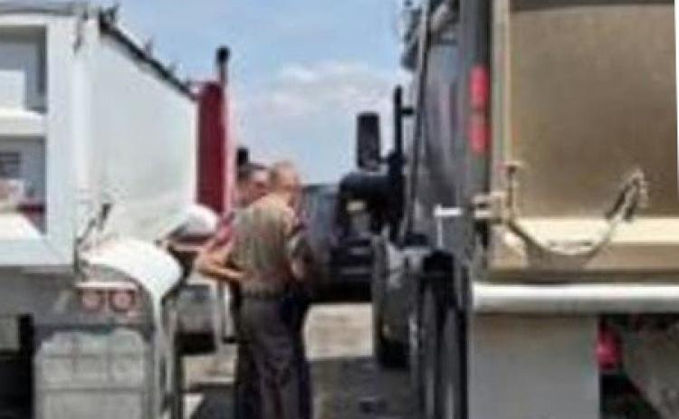 DPS INSPECTIONS In an undisclosed location, state troopers inspect semi trucks for violations, and drivers for the correct licensing—keeping the roads safe for drivers in the Knox County area. | COURTESY PHOTO