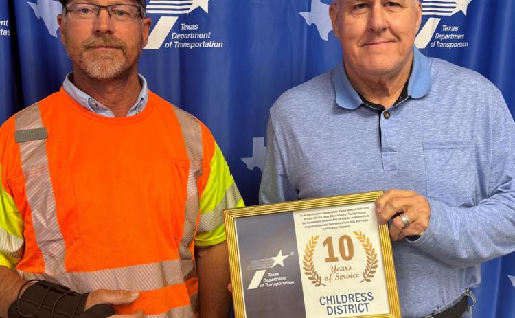 10 YEARS SERVICE AWARD was presented last week to Knox County’s Nathan Herring (left) by TxDOT Childress District Engineer Darwin Lankford. | COURTESY PHOTO
