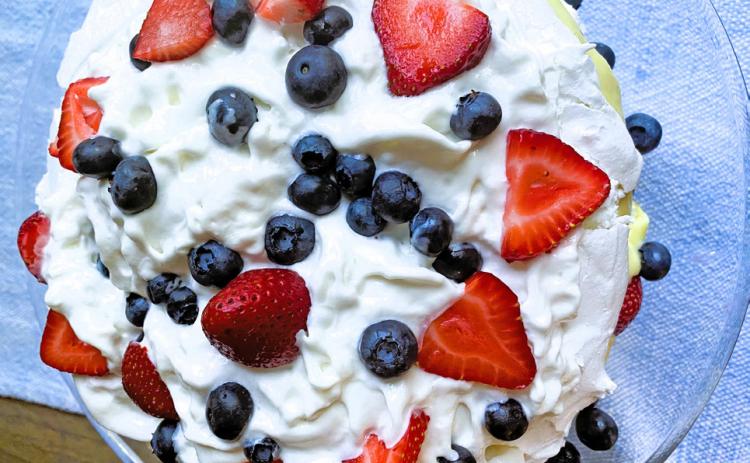 THE PAVLOVA CAKE has been revived and made more popular in recent years; this one includes fresh blueberries and sliced strawberries for a nice summery touch. | ANGELINA LaRUE PHOTO