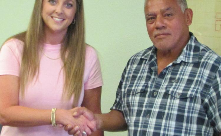 Church of Christ preacher Leroy Torres sworn in as returning City Council member by Municipal Judge Laura Hampel at the Munday City Council meeting on Aug. 8. | DON THOMPSON / NEWS - COURIER